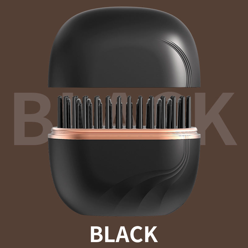 mini brosse chauffante noire